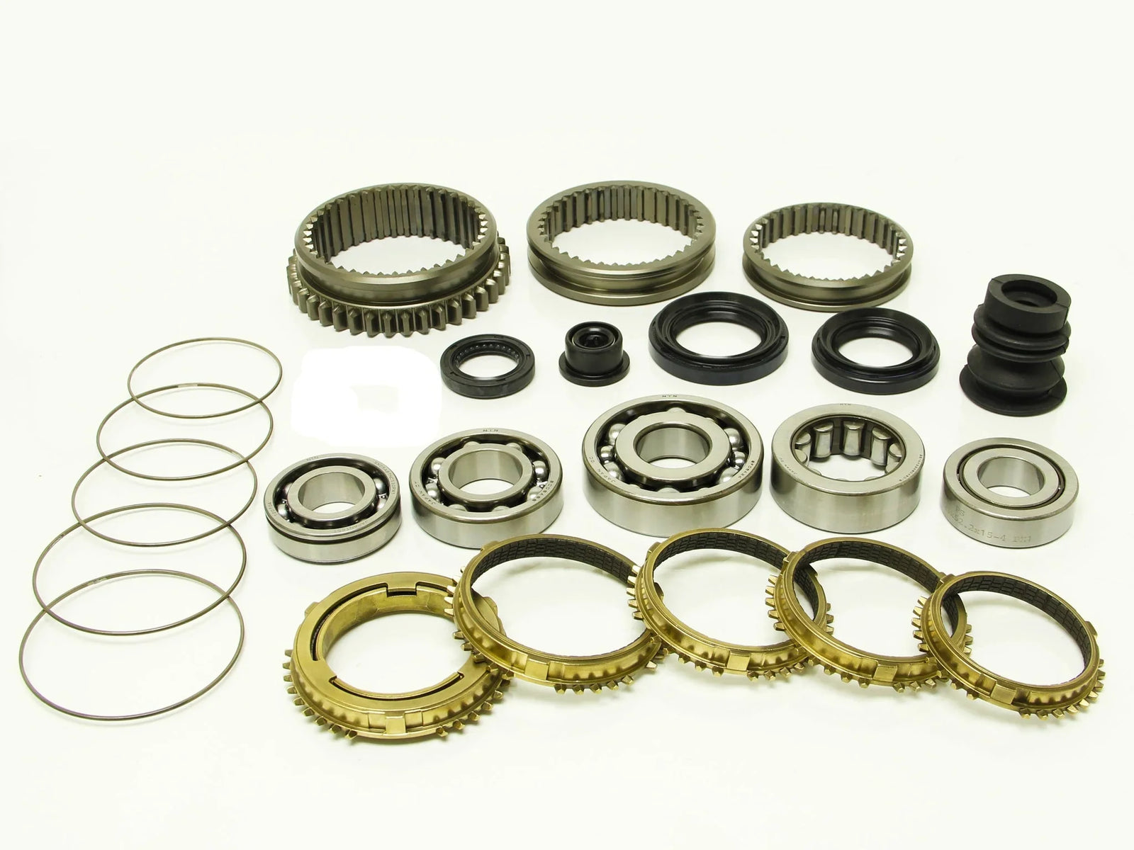 Synchrotech 1994-2001 Honda Acura Type R GSR B16 B18C Kit Includes: SYN101 1-5 Carbon Synchro Set, SP101 1-5 Synchro Springs, Brass reverse synchro and spring, BSK-S80 Bearing & Seal Kit, 1/2/3/4/5 Sleeves