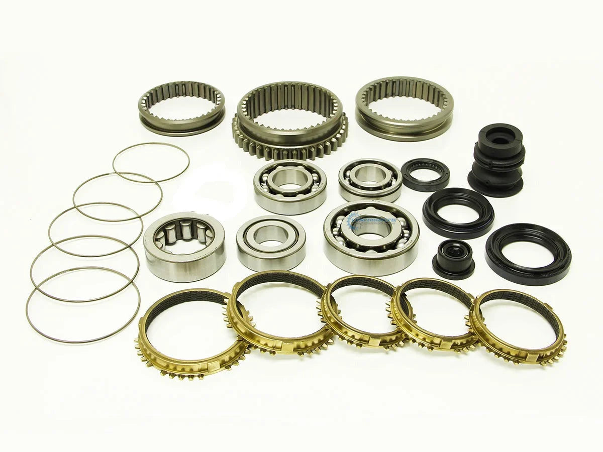 Synchrotech 1992-1993 Honda Acura LS YS1 Kit Includes: SYN107 1-5 Carbon Synchro Set, SP107 1-5 Synchro Springs, Brass reverse synchro and spring, BSK-YS1 Bearing & Seal Kit, 1/2/3/4/5 Sleeves