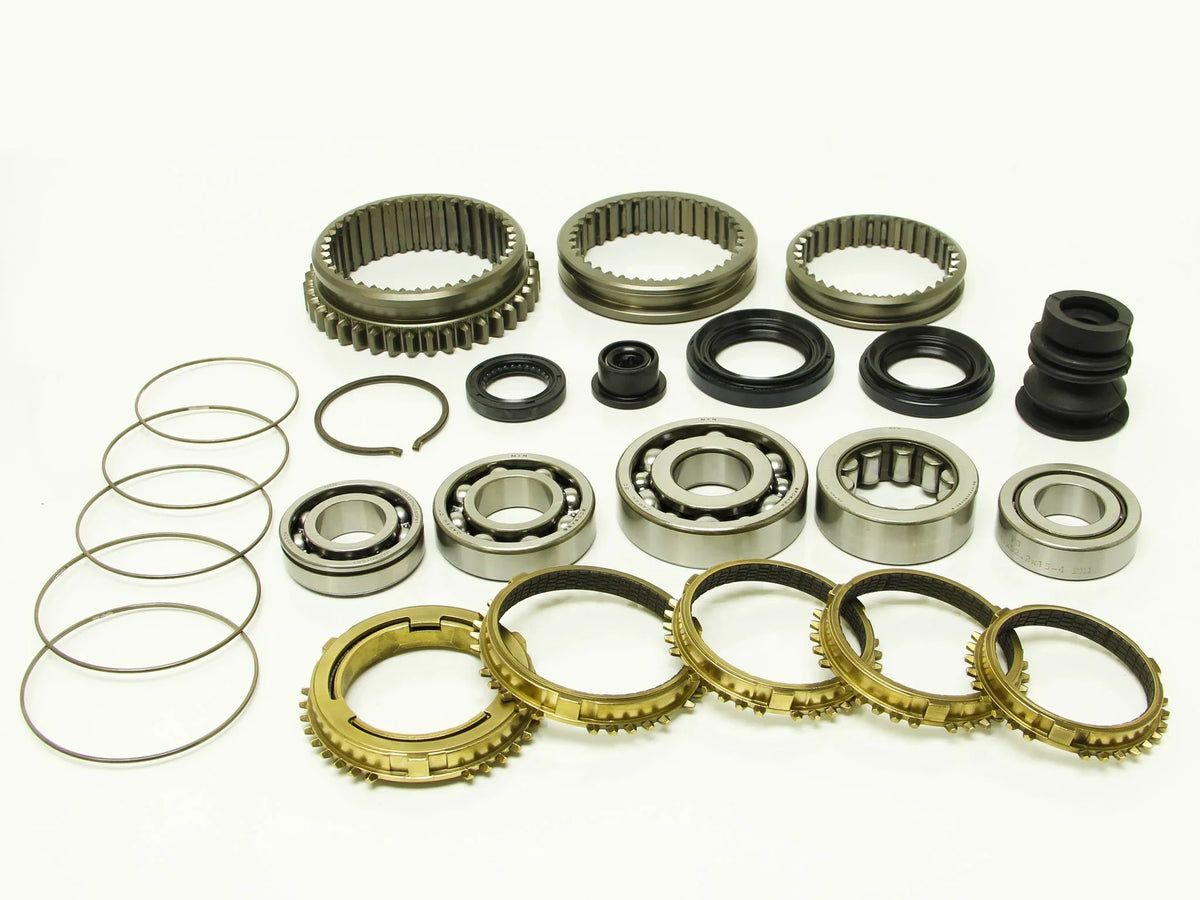 Synchrotech Honda Euro R Accord U2Q7 T2W4 Kit Includes: SYN109E 1-5 Carbon Synchro Set, SP109 1-5 Synchro Springs, Brass reverse synchro and spring, BSK-H22 Bearing & Seal Kit, 1/2/3/4/5 Sleeves